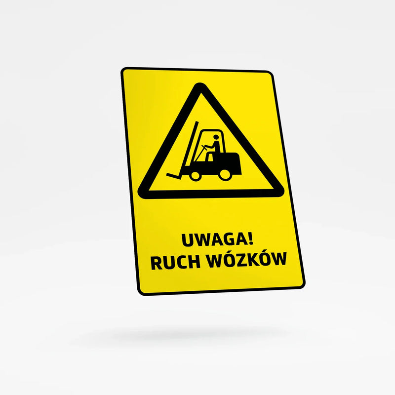 Warning sign with text - caution: forklift traffic
