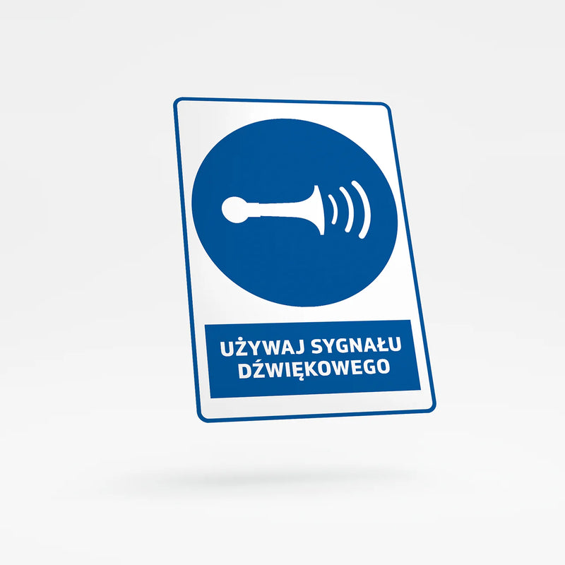 Mandatory sign with text - sound your horn